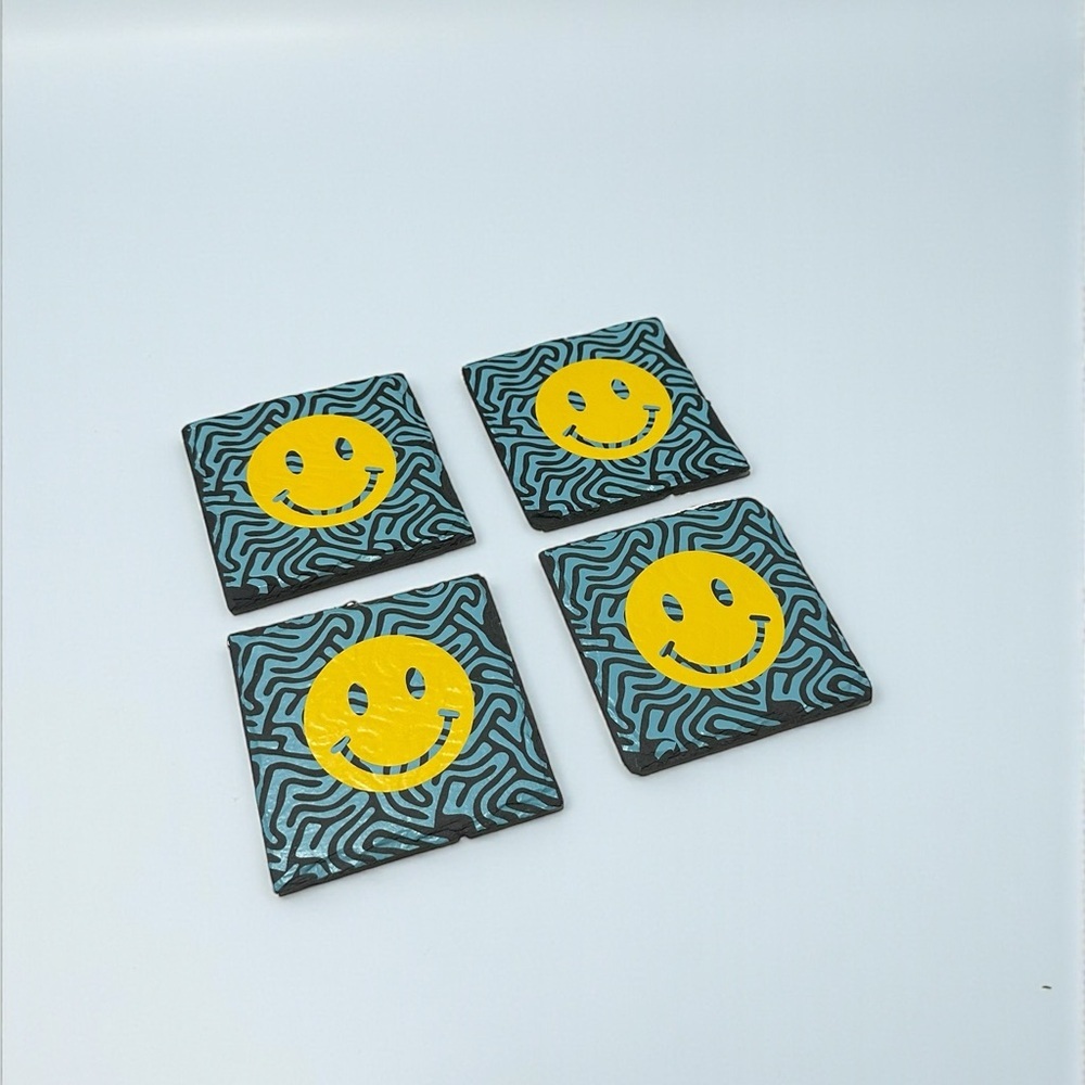 4 Blue And Yellow Smiley Black Stone Coasters
